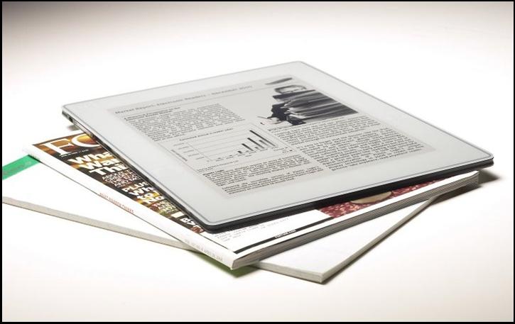 Electronics replacing paper — digital tablet versus paper magazines